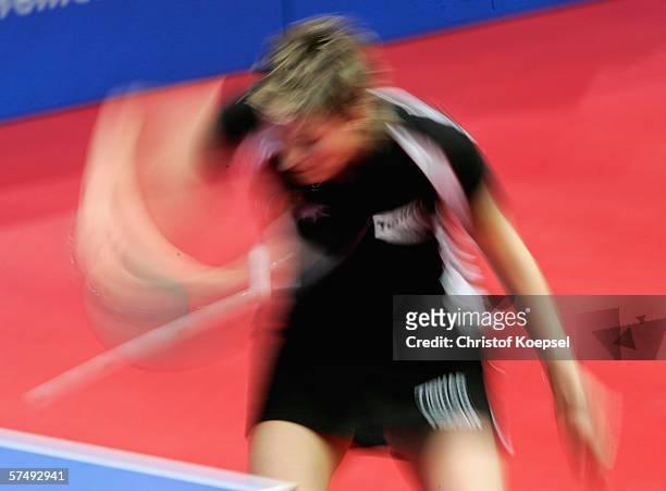 Viktoria Pavlovich of Belarus serves against Yue Guo of China in the women half-final during the sixth day of the Liebherr World Team Table Tennis...