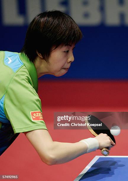 Yining Zhang of China plays a forehand against Veronika Pavlovich of Belarus in the women half-final during the sixth day of the Liebherr World Team...