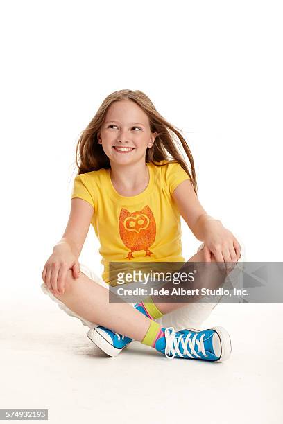 happy girl - cross legged stock pictures, royalty-free photos & images