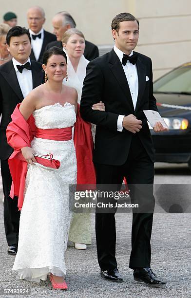 Jonas Bergstrom, boyfriend of Swedish Crown Princess Madeleine, arrives with Emma Pernald, girlfriend of Swedish Prince Carl Philip, for H.M. King...