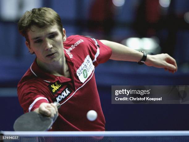 Werner Schlager of Austria plays a backhand against Ching Li of Honk Kong in the mens quarter-final during the sixth day of the Liebherr World Team...