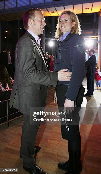 Personality Johannes B. Kerner and his wife Britta Becker attend the Bayern Munich party after the German Cup final between Bayern Munich and...