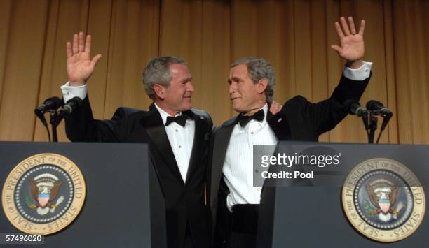 President George W. Bush and his inner monologue, played by Steve Bridges, entertain guests at the White House Correspondents' Dinner April 29, 2006...