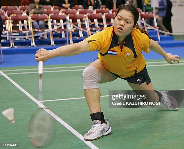 Mia Audina Tjiptawan of the Netherlands returns the shuttelcock during a women's single match against Julia Mann of England at the preliminary round...