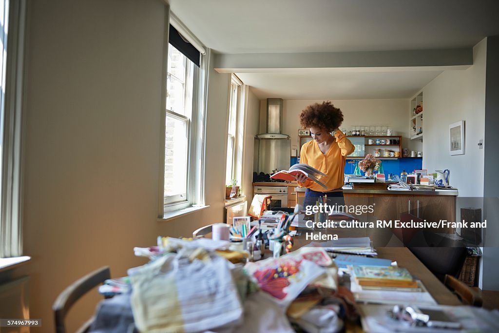 Designer working in kitchen