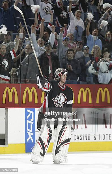 Ryan Miller of the Buffalo Sabres acknowledges the crowd after being named the first star after a shutout victory against the Philadelphia Flyers in...