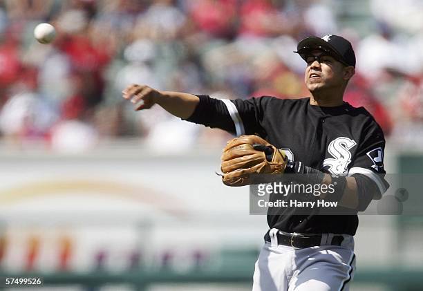 Second baseman Alex Cintron of the Chicago White Sox makes a throw to first base for an out against the Los Angeles Angels of Anaheim in the eighth...