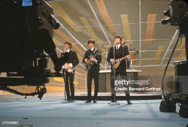 British pop and rock music group the Beatles perform on the television variety program, 'The Ed Sullivan Show' at CBS's Studio 50, New York, New...