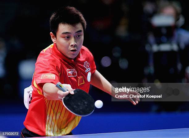 Hao Wang of China plays a forehand against Sang Eun Oh of South Korea during the men's final at the last day of the Liebherr Team Table Tennis...