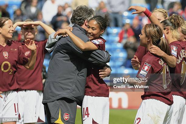 Manages Vic Akers hugs Rachel Yankey of Arsenal Ladies after winning the Womens FA Cup Final match between Leeds United Ladies v Arsenal Ladies at...