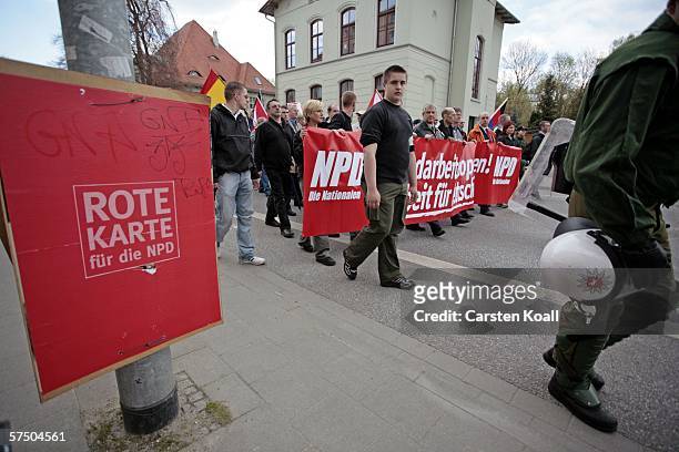 Members of Germany's neo-Nazi National Democratic Party rally through the streets May 01, 2006 in Rostock, Germany. The rally is also the opening of...