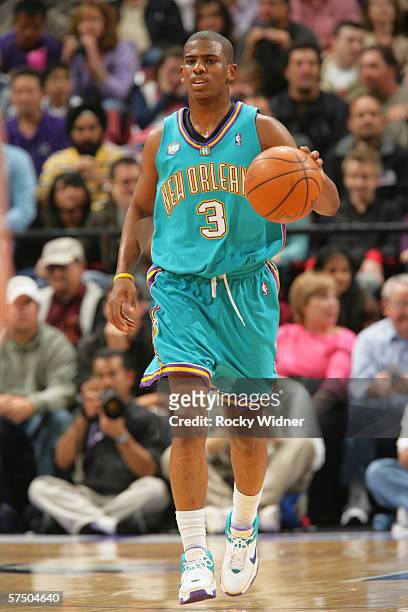 Chris Paul of the New Orleans/Oklahoma City Hornets brings the ball up court against the Sacramento Kings on April 16, 2006 at ARCO Arena in...