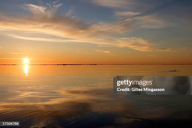 The Chukchi Sea lies flat under the soft Arctic 3 am sunlight, during the traditional Inupiat Eskimos spring hunt, June 14, 2005 on the Chukchi Sea...