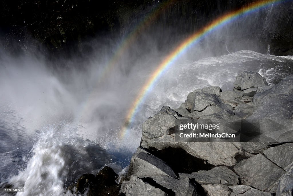 Rainbows in Dettifoss waterfall, Iceland