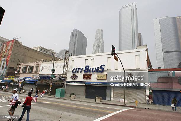 Los Angeles, UNITED STATES: Businesses along Broadway in downtown Los Angeles are shuttered as part of the immigrant boycott 01 May 2006. Hundreds of...