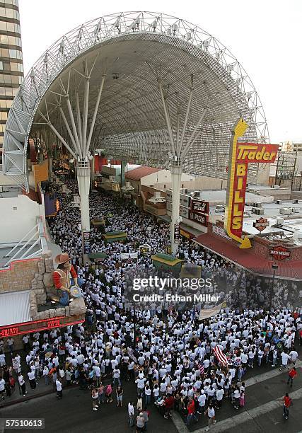 Thousands of people rally at the Fremont Street Experience in support of immigrant rights as part of "Day Without Immigrants" May 1, 2006 in Las...