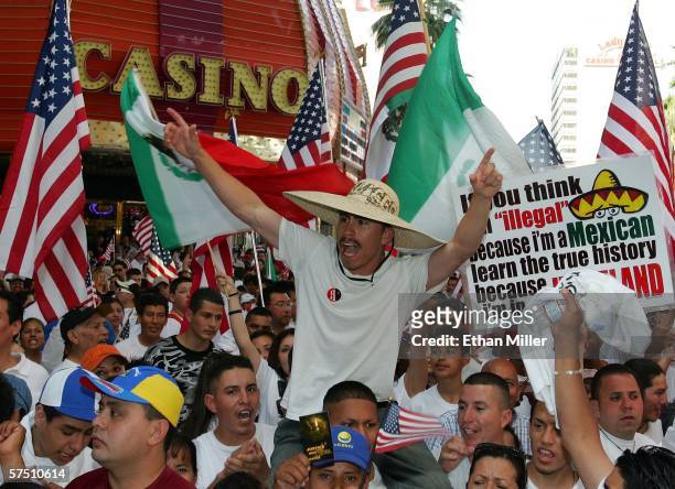 Thousands of people rally at the Fremont Street Experience in support of immigrant rights as part of "Day Without Immigrants" May 1, 2006 in Las...