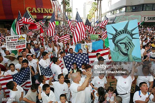 Thousands of people rally at the Fremont Street Experience in support of immigrant rights as part of "Day Without Immigrants" May 1, 2006 in Las...