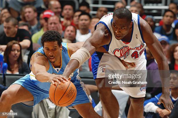 Andre Miller of the Denver Nuggets loses the ball to Elton Brand of the Los Angeles Clippers in game five of the Western Conference Quarterfinals...