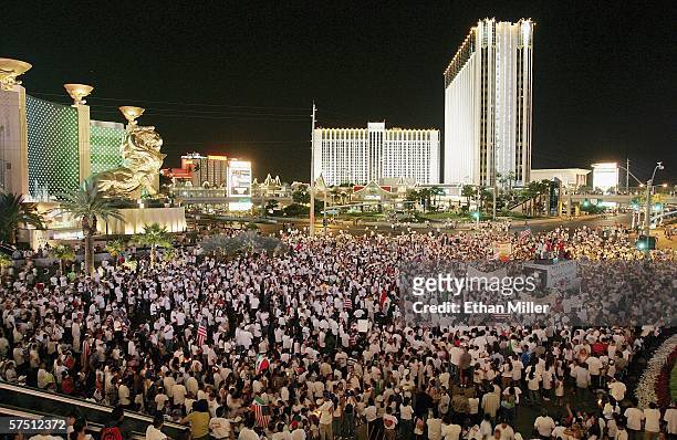 The MGM Grand Hotel/Casino and Tropicana Resort and Casino are seen behind thousands of people as they rally in support of immigrant rights as part...