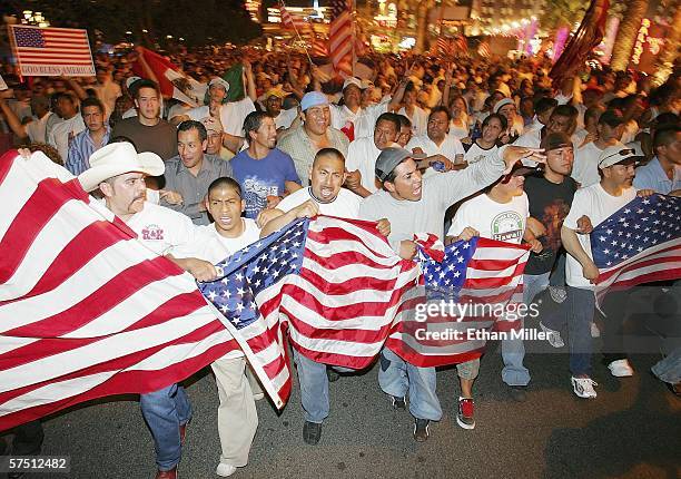 People march down the Las Vegas Strip in support of immigrant rights as part of a "Day Without Immigrants" on May 1, 2006 in Las Vegas, Nevada. An...