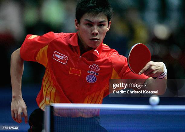 Qi Chen of China plays a backhand against Dany Lo of France in the quarter-final during the sixth day of the Liebherr World Team Table Tennis...