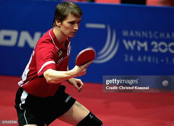 Werner Schlager of Austria plays a backhand against Chu Yan Leung of Honk Kong in the mens quarter-final during the sixth day of the Liebherr World...