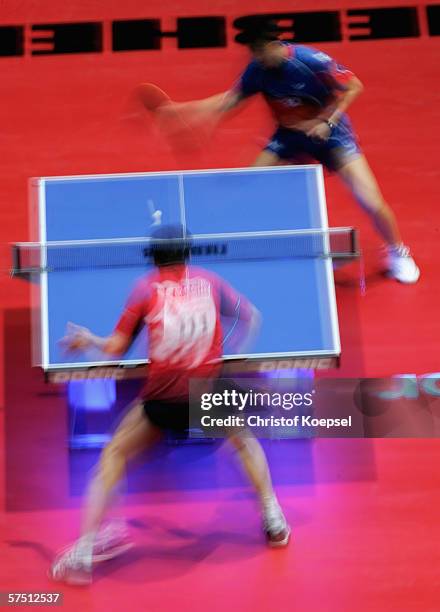 Sang Eun Oh of South Korea serves against Marek Klasek of the Czech Republik in themens quarter-final during the sixth day of the Liebherr World Team...