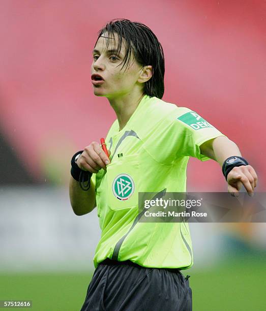 Referee Anja Kunick gestures during the Women's DFB German Cup final between 1.FFC Turbine Potsdam and 1.FFC Frankfurt at the Olympic Stadium on...