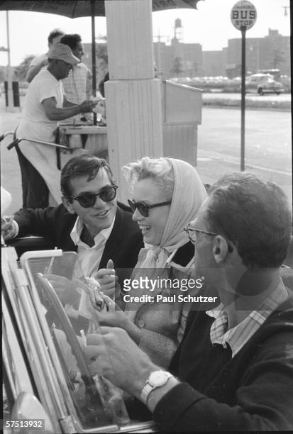 Shortly after their marriage, American actress Marilyn Monroe and American playwright Arthur Miller , along with Monroe's close friend, American...
