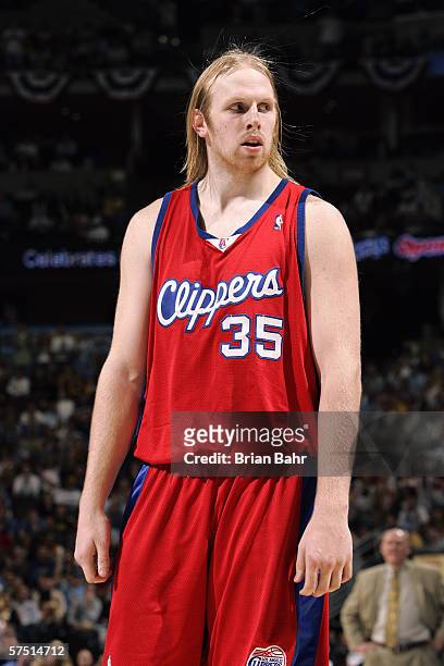 Chris Kaman of the Los Angeles Clippers stands on the floor in game three of the Western Conference Quarterfinals against the Denver Nuggets during...