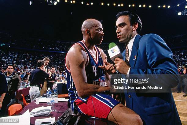 Charles Barkley of the Houston Rockets speaks to a reporter after defeating the Dallas Mavericks 108-106 on December 6, 1997 at the Palacio de los...