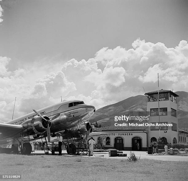View of an Pan American Grace Airways a DC-4 Pan American Clipper plane on the tarmac in Quito, Ecuador.