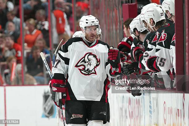 Dumont of the Buffalo Sabres celebrates Maxim Afinogenov's second peorid goal against the Philadelphia Flyers in game six of the Eastern Conference...