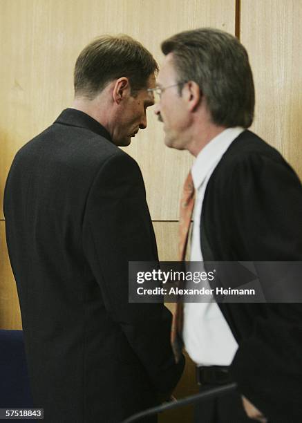 N bGermany's self-confessed cannibal Armin Meiwes enters, accompanied by his lawyer Joachim Bremer , the courtroom, for his retrial for murder, on 03...