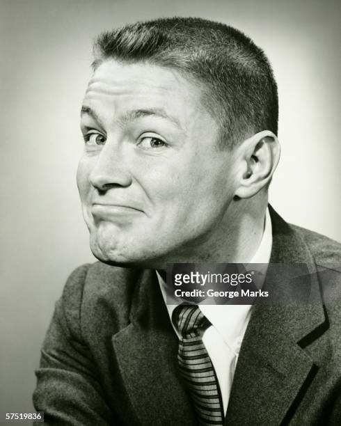 man making face in studio, (b&w), close-up - crew cut stock pictures, royalty-free photos & images