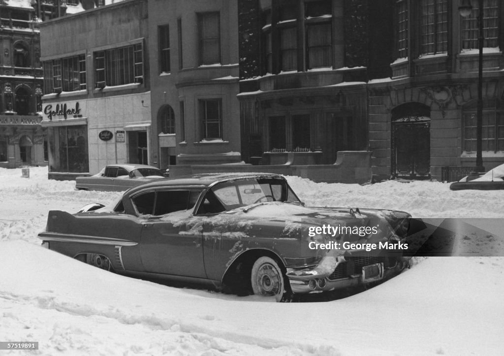 Road-cruiser parked on town street, winter, (B&W)