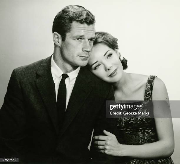 romantic couple in studio, (b&w), portrait - 1950s couple stock pictures, royalty-free photos & images