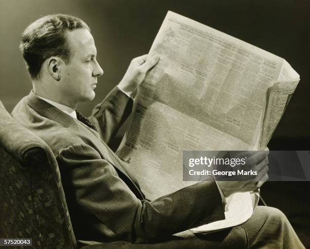 businessman reading newspaper, (b&w) - reading paper stock pictures, royalty-free photos & images