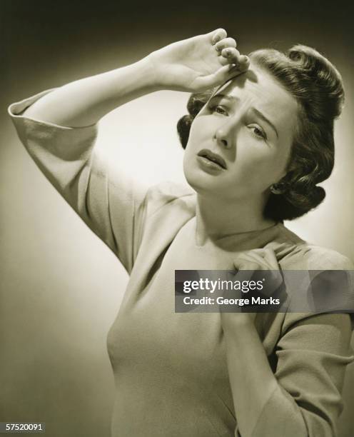 woman suffering headache, posing in studio, (b&w), portrait - angry woman vintage bildbanksfoton och bilder