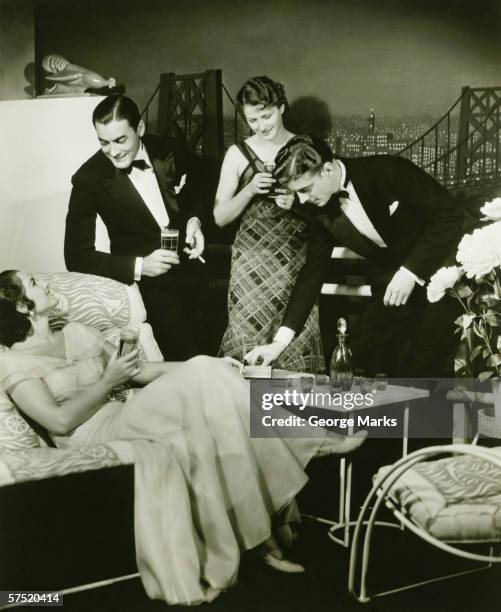 two elegant couples on party, (b&w) - vintage glamour stock pictures, royalty-free photos & images