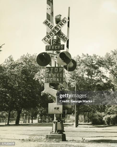 Vintage Railroad Crossing Signs Photos and Premium High Res Pictures ...