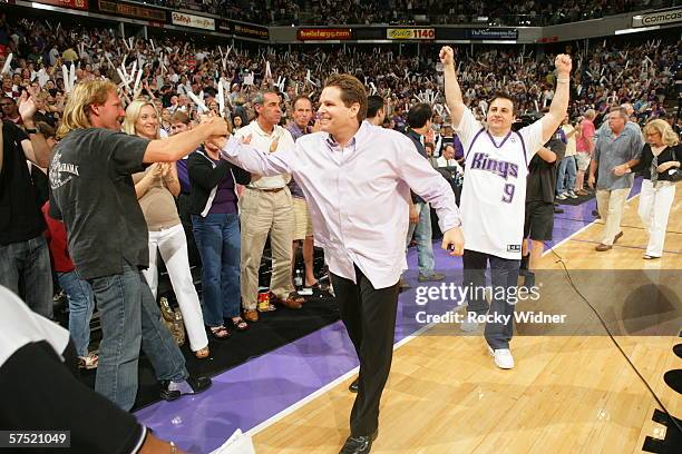 Sacramento Kings owners, Joe and Gavin Maloof, celebrate the victory over the San Antonio Spurs in game four of the Western Conference Quarterfinals...