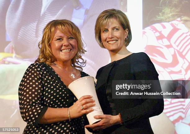 Sophie, Countess of Wessex presents an award to Coronation Street actress Wendi Peters at the ChildLine Patrons awards at the BT Tower on May 2, 2006...