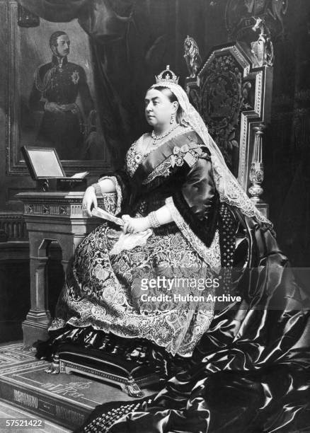 An 1883 painting of Queen Victoria , taken from an 1882 photograph by Alexander Bassano. Behind the queen is a portrait of her deceased consort,...
