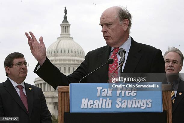 Rep. Michael Burgess , United States Treasury Secretary John Snow and Rep. Tom Price hold a news conference to introduce the Tax-Free Health Savings...