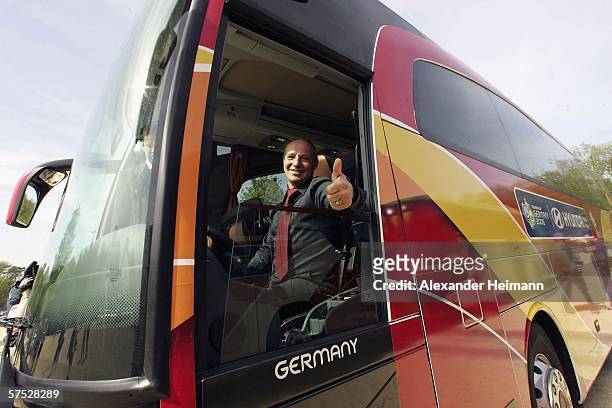 Wolfgang Hochfellner, the busdriver of the German team, gestures during the Delivery of the Team Transportation for the World Cup 2006 Germany at the...
