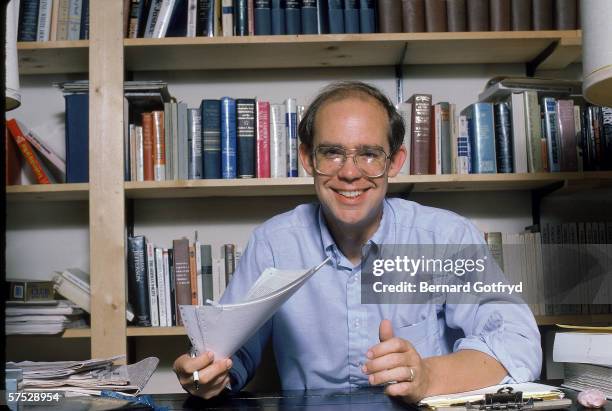 American author, editor, and political scientist David Eisenhower, grandson of former President Dwight D. Eisenhower, sits at a desk in his home...