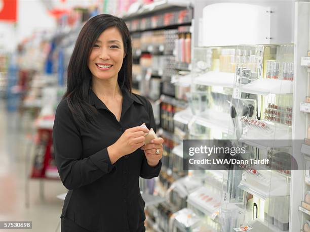 female employee smiling for the camera - korean language stock pictures, royalty-free photos & images