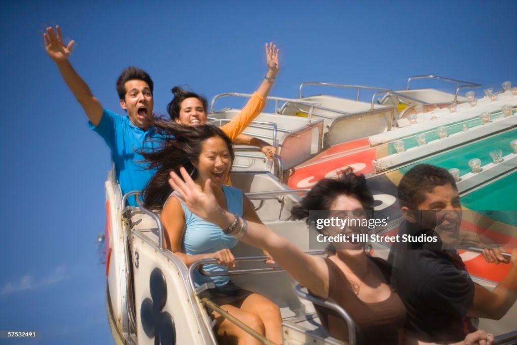 People Riding A Roller Coaster High-Res Stock Photo - Getty Images